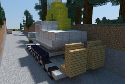 Truck with trailer and excavator schematic - building